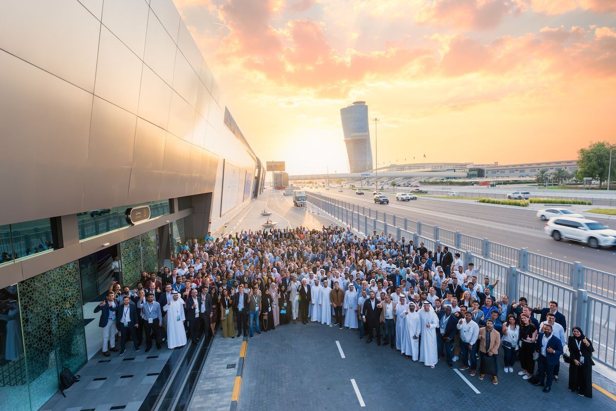 G42 group photograph outside an exhibition venue